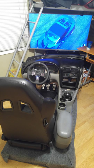 Illustration for article titled Totally amazing home built racing simulator found on Facebook!!!